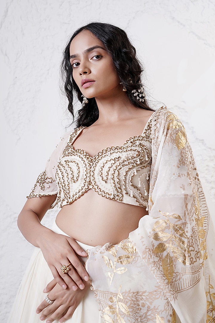 Ivory Organza Ruffled Wedding Lehenga Set by Shwetanga at Pernia's Pop Up Shop