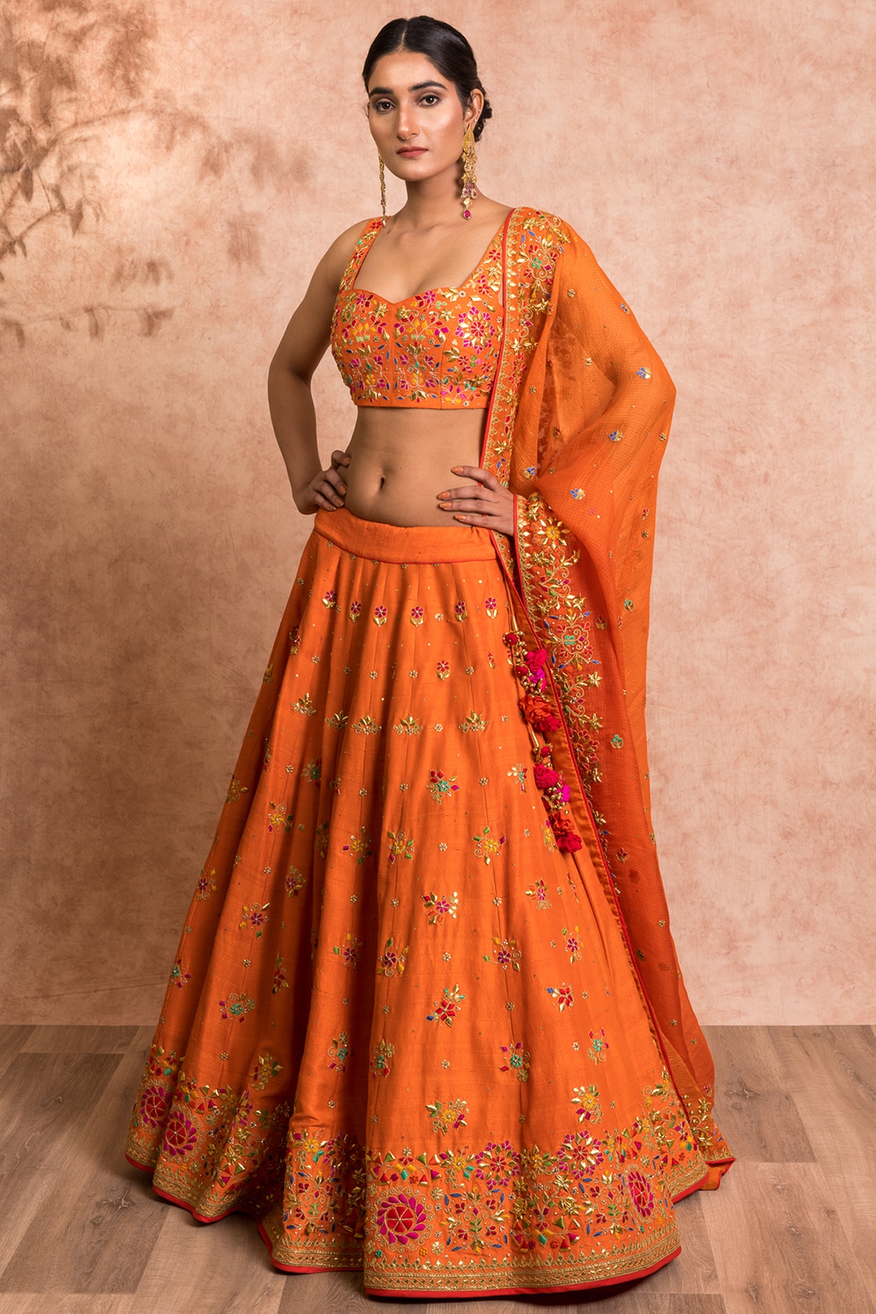 Buy Orange Net Embroidery Floral Round Bridal Lehenga Set For Women by  Riantas Online at Aza Fashions.
