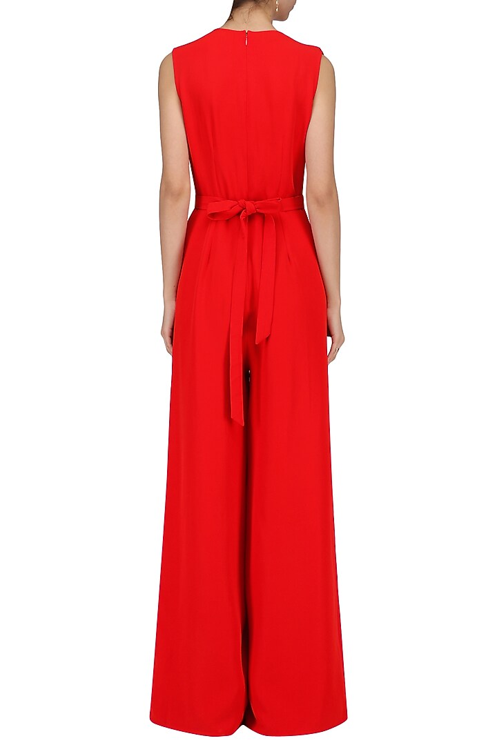 Crimson jumpsuit with cape sleeves available only at Pernia's Pop Up Shop.