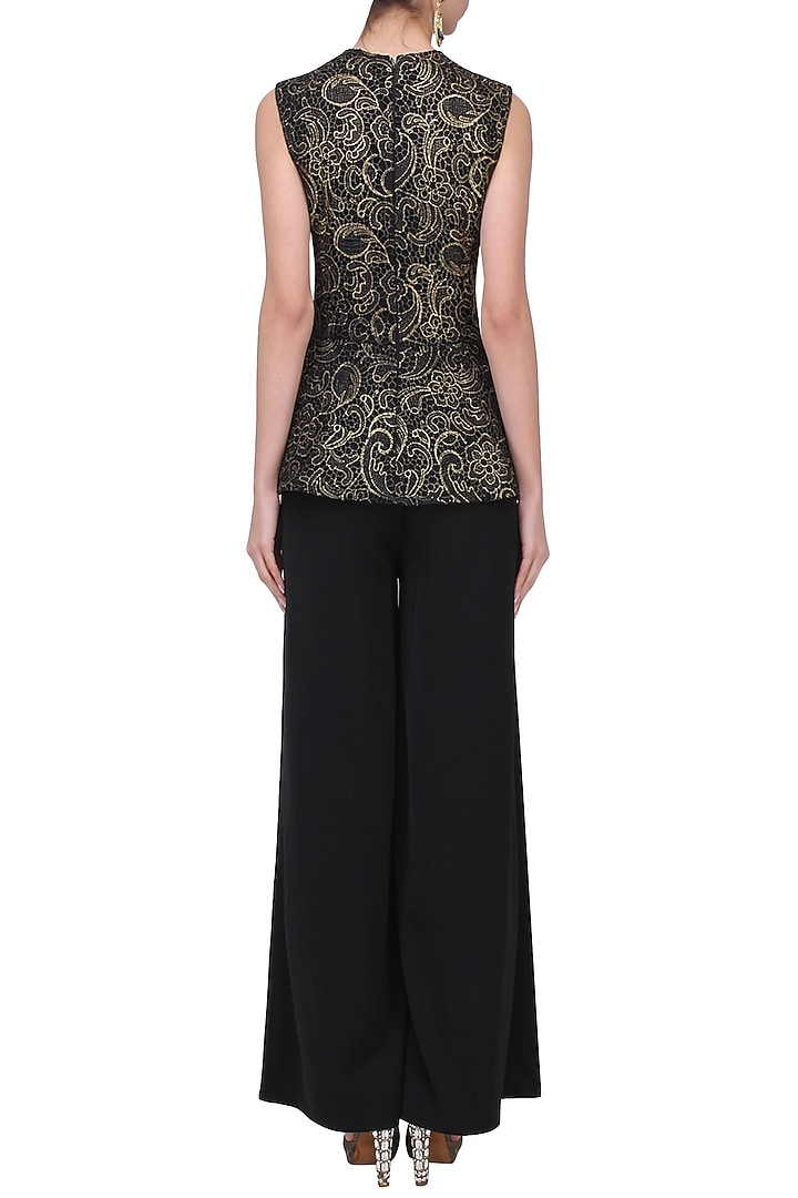 Black and gold peplum top available only at Pernia's Pop Up Shop.