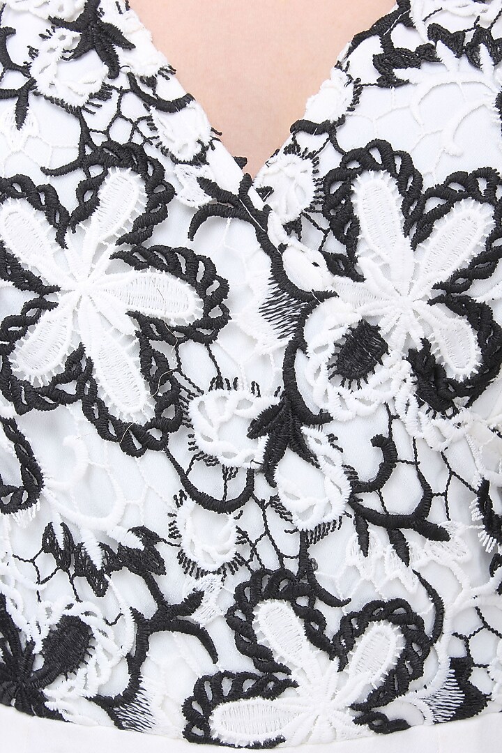 Black and white floral jumpsuit available only at Pernia's Pop Up Shop.