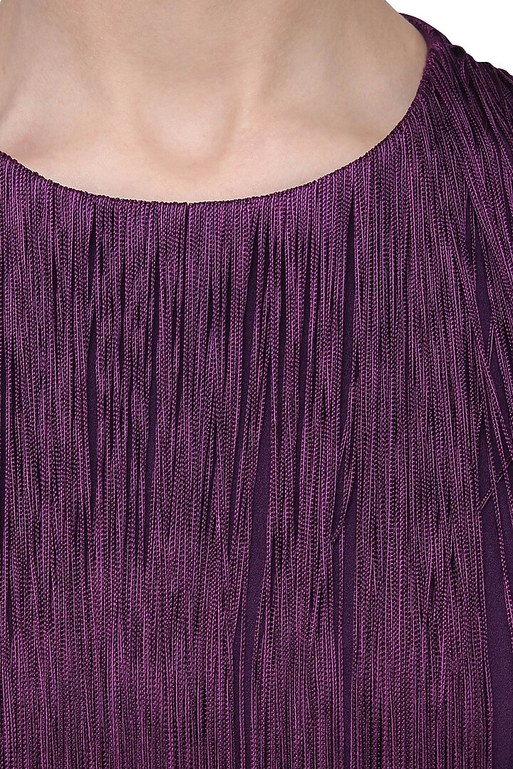 Purple fringe jumpsuit available only at Pernia's Pop Up Shop.