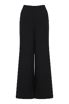 Black palazzo pants available only at Pernia's Pop Up Shop. 2023