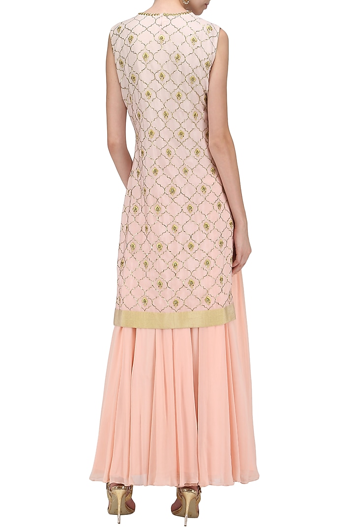 A peach crepe stright suit with skirt and dupatta available only at Pernia's Pop Up Shop.
