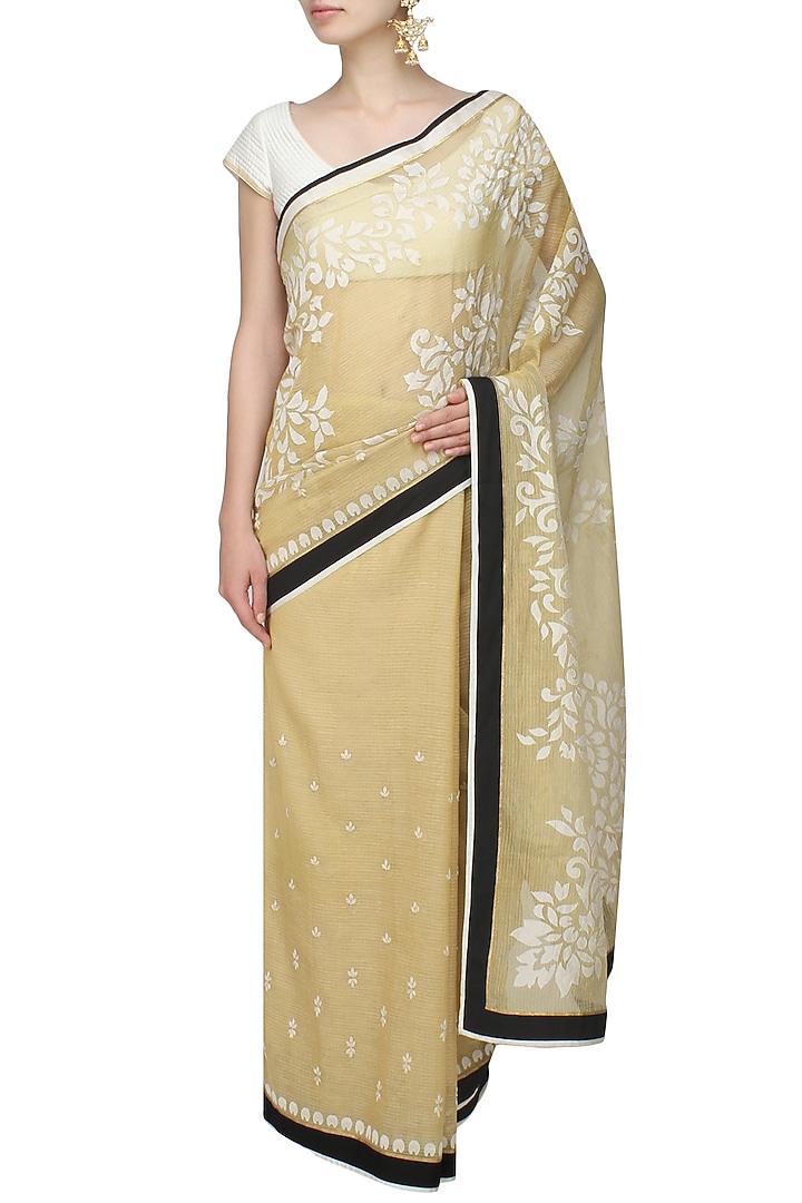 Gold and off white floral embroidered saree and quilted blouse set available only at Pernia's Pop Up Shop.
