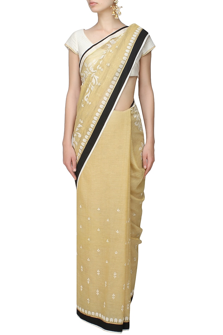 Gold and off white floral embroidered saree and quilted blouse set available only at Pernia's Pop Up Shop.