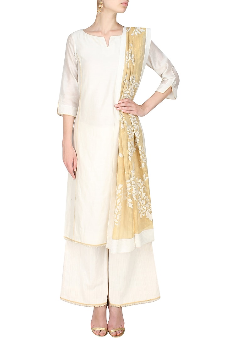Ivory lace chanderi kurta and textured palazzos set available only at Pernia's Pop Up Shop.