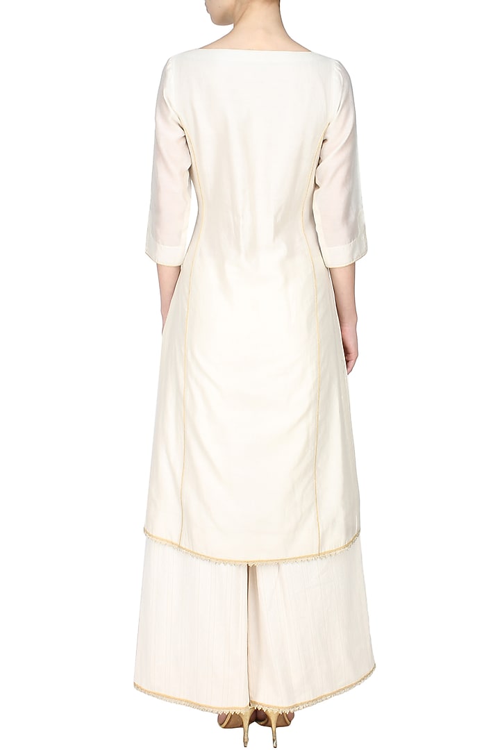 Ivory lace chanderi kurta and textured palazzos set available only at Pernia's Pop Up Shop.
