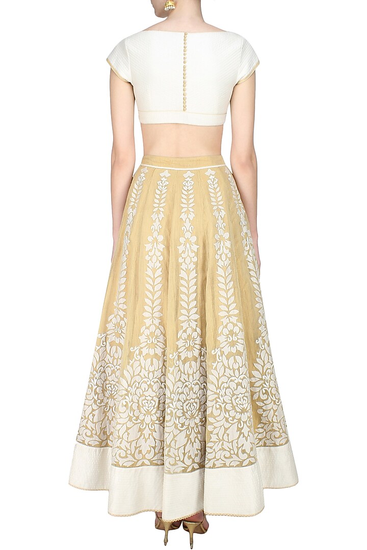 Gold floral chanderi applique work lehenga and corset blouse set available only at Pernia's Pop Up Shop.