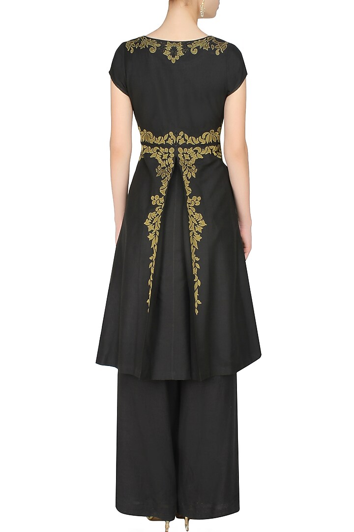 Black handcut motif back earthen gilden tunic and pants set available only at Pernia's Pop Up Shop.