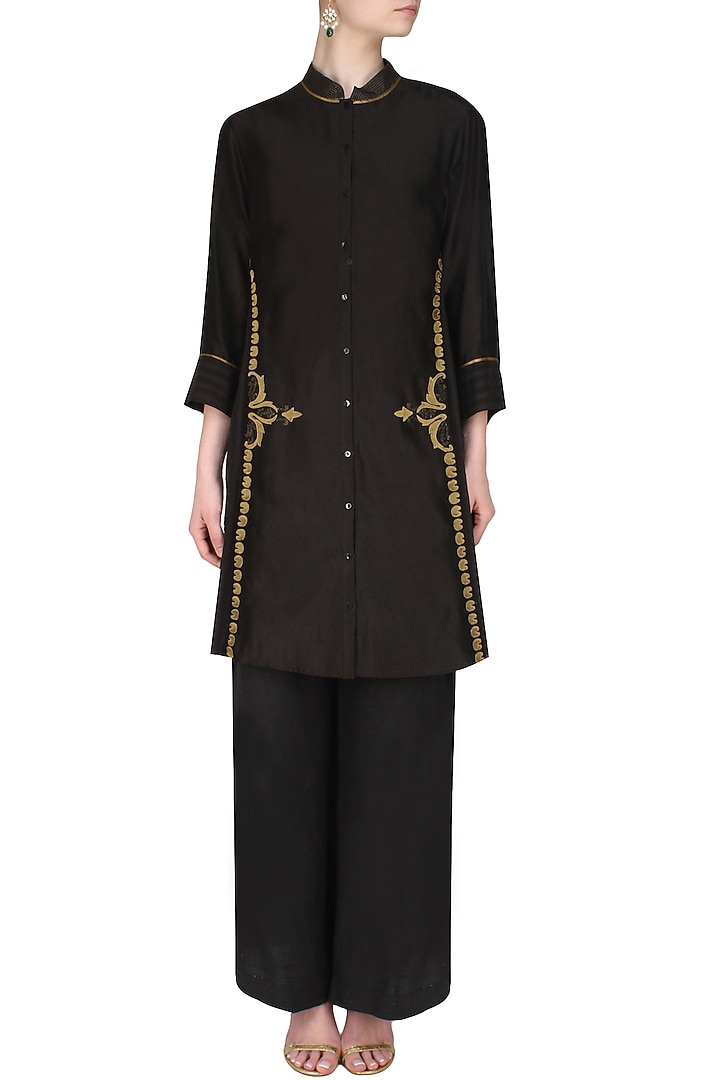 Black handcut motif back winged tall shirt available only at Pernia's Pop Up Shop.