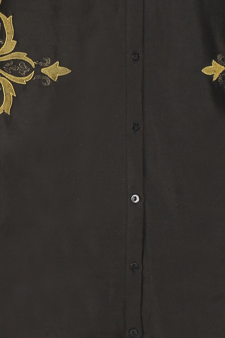 Black handcut motif back winged tall shirt available only at Pernia's Pop Up Shop.