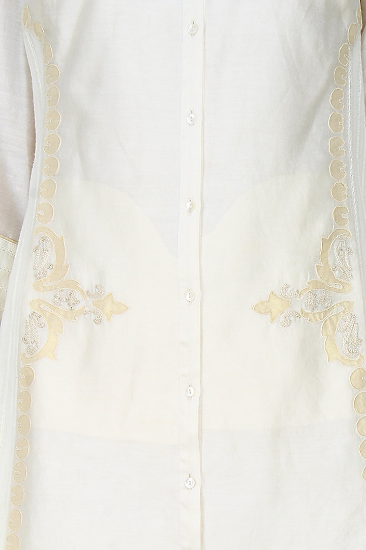 Ivory handcut motif back winged tall shirt available only at Pernia's Pop Up Shop.