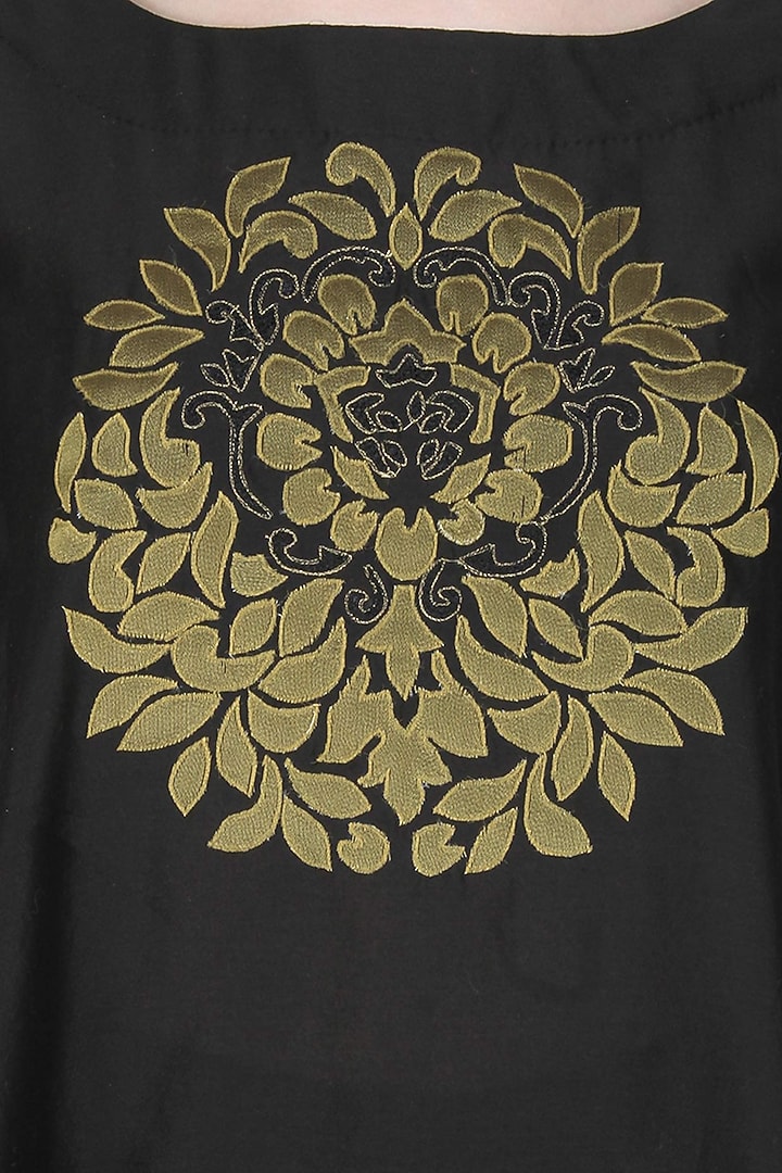 Black handcut motif asymmetric flared top available only at Pernia's Pop Up Shop.