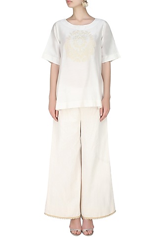 Ivory handcut motif asymmetric flared top by SWGT By Shweta Gupta