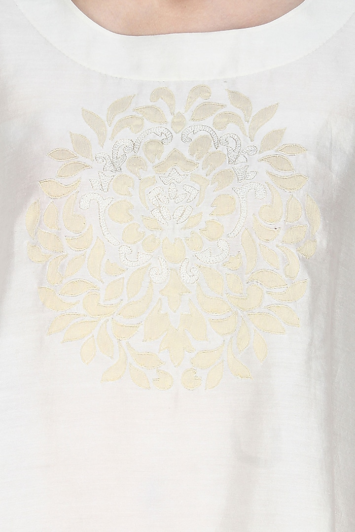 Ivory handcut motif asymmetric flared top available only at Pernia's Pop Up Shop.