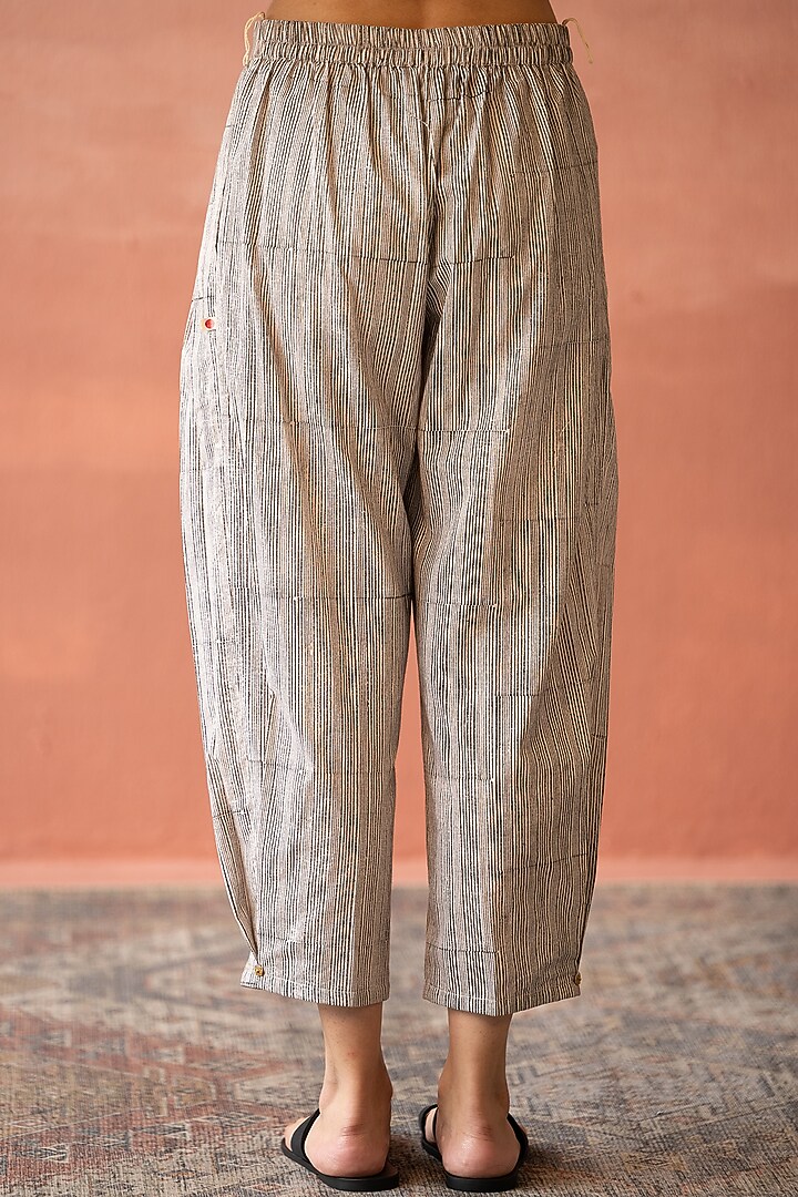 Bone White Cotton Hand Block Printed Pants by Swatti Kapoor at Pernia's Pop Up Shop