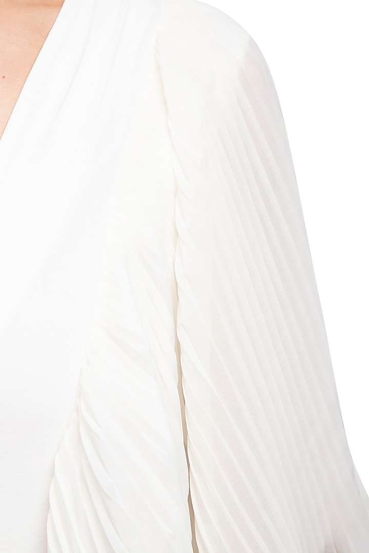 Ivory pleated drape jumpsuit by Swatee Singh at Pernia's Pop Up Shop
