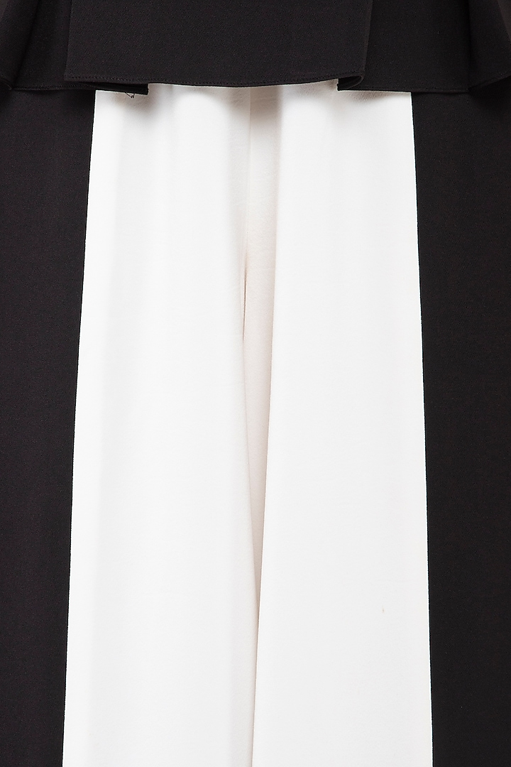 Black and ivory box pleated jumpsuit by Swatee Singh at Pernia's Pop Up Shop
