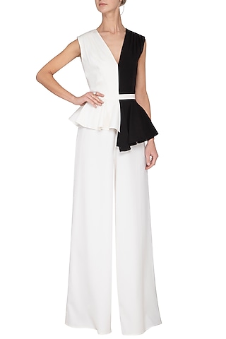 Black and ivory pleated peplum jumpsuit by Swatee Singh
