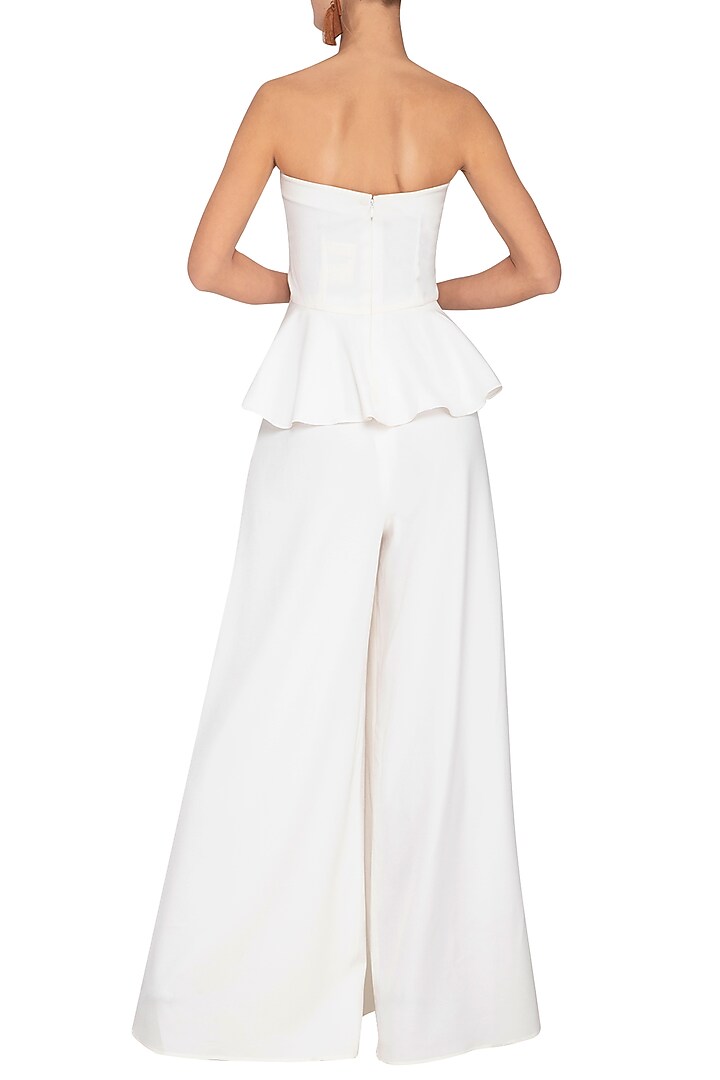 Ivory flared drape pants by Swatee Singh at Pernia's Pop Up Shop