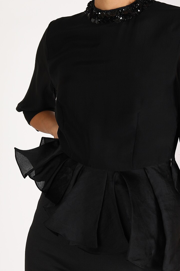 Black Asymmetric Peplum Top by Shriya Som at Pernia's Pop Up Shop