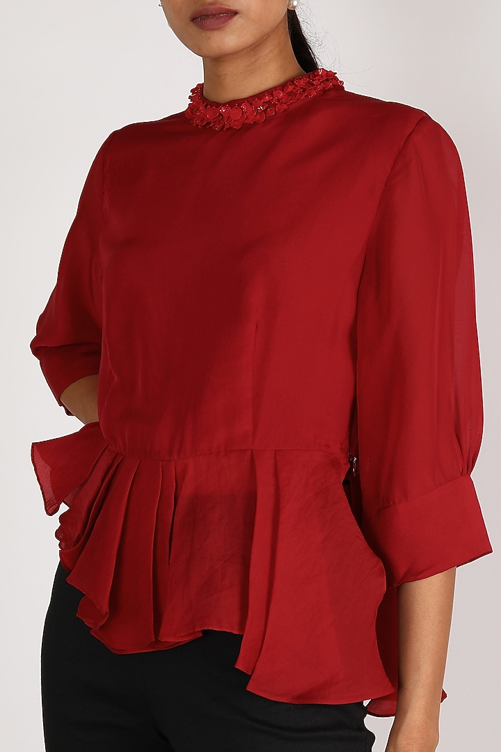 Red Asymmetric Peplum Top by Shriya Som at Pernia's Pop Up Shop
