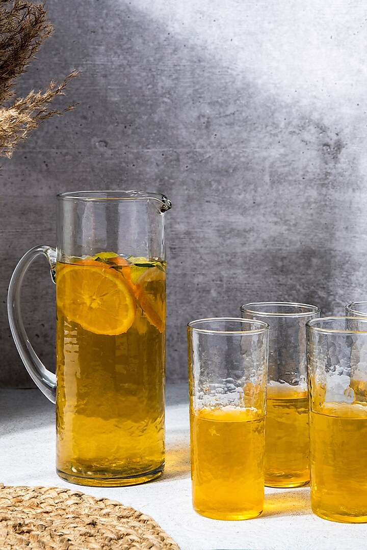 Transparent Glass Hammered Pitcher and Glasses Set by The Table Fable at Pernia's Pop Up Shop