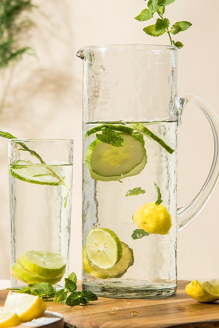 Transparent Glass Hammered Pitcher and Glasses Set by The Table Fable at Pernia's Pop Up Shop