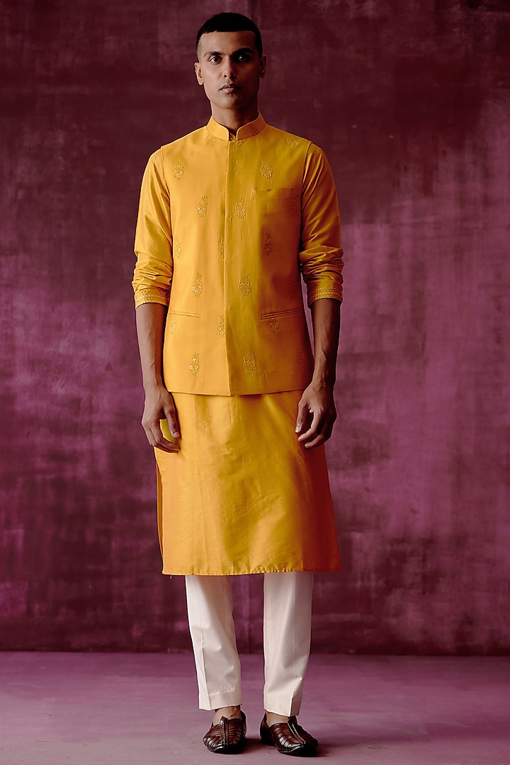 Ochre Yellow Cotton Silk Sequins Hand Embroidered Bundi Jacket Set by Pouli Pret Men