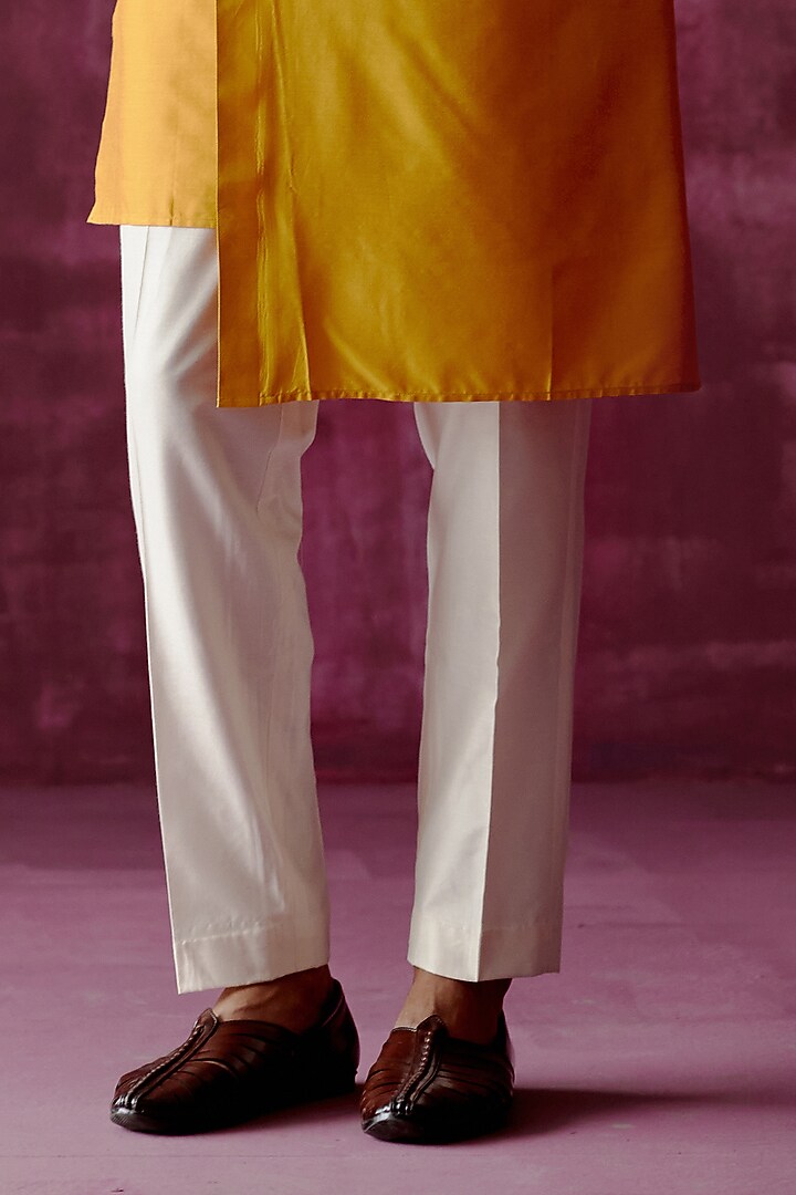 Ochre Yellow Cotton Satin Asymmetric Kurta Set by Pouli Pret Men at Pernia's Pop Up Shop