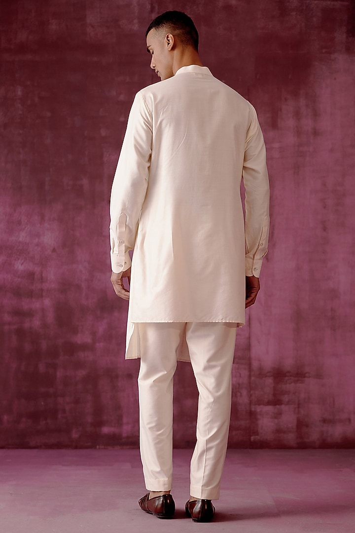Off-White Cotton Satin Asymmetric Kurta Set by Pouli Pret Men at Pernia's Pop Up Shop
