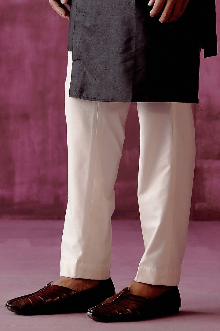 Black Cotton Satin Asymmetric Kurta Set by Pouli Pret Men at Pernia's Pop Up Shop
