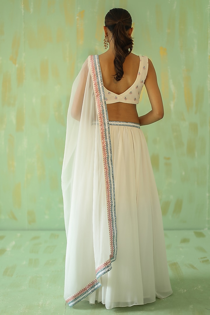 White Embroidered Wedding Lehenga Set by POULI at Pernia's Pop Up Shop