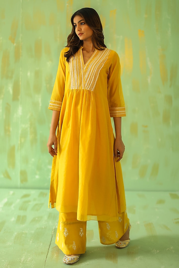 Ochre Yellow Hand Embroidered Kurta Set by POULI at Pernia's Pop Up Shop