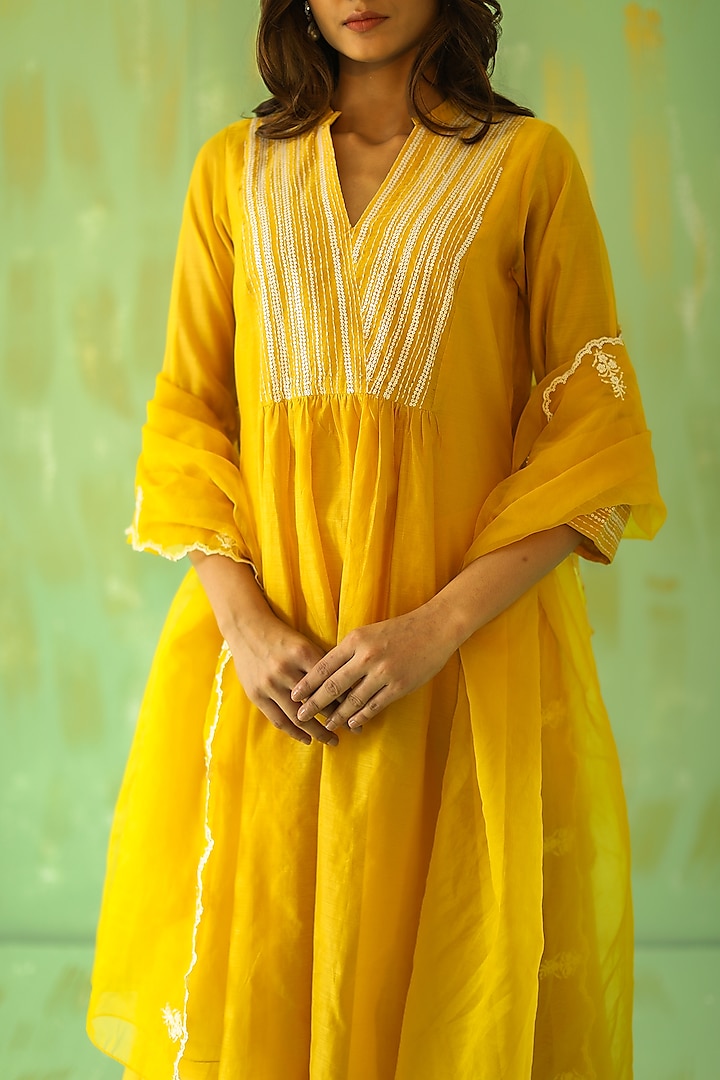 Ochre Yellow Hand Embroidered Kurta Set by POULI at Pernia's Pop Up Shop