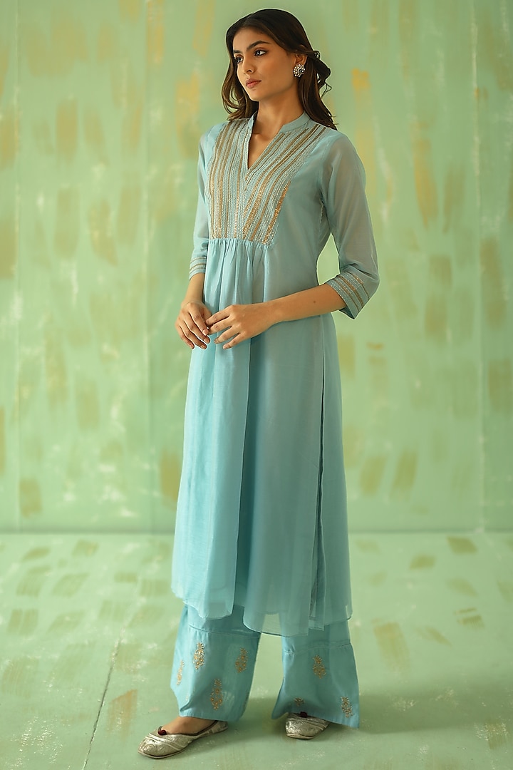 Powder Blue Hand Embroidered Kurta Set by POULI at Pernia's Pop Up Shop