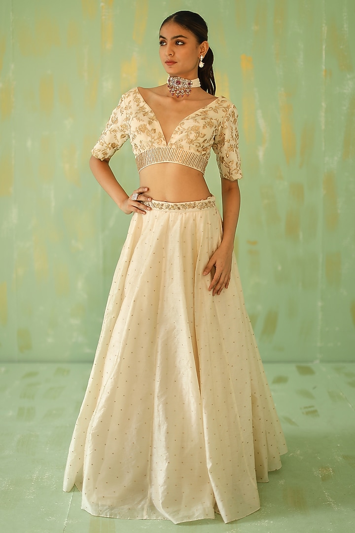 Cream Embroidered Wedding Lehenga Set by POULI at Pernia's Pop Up Shop