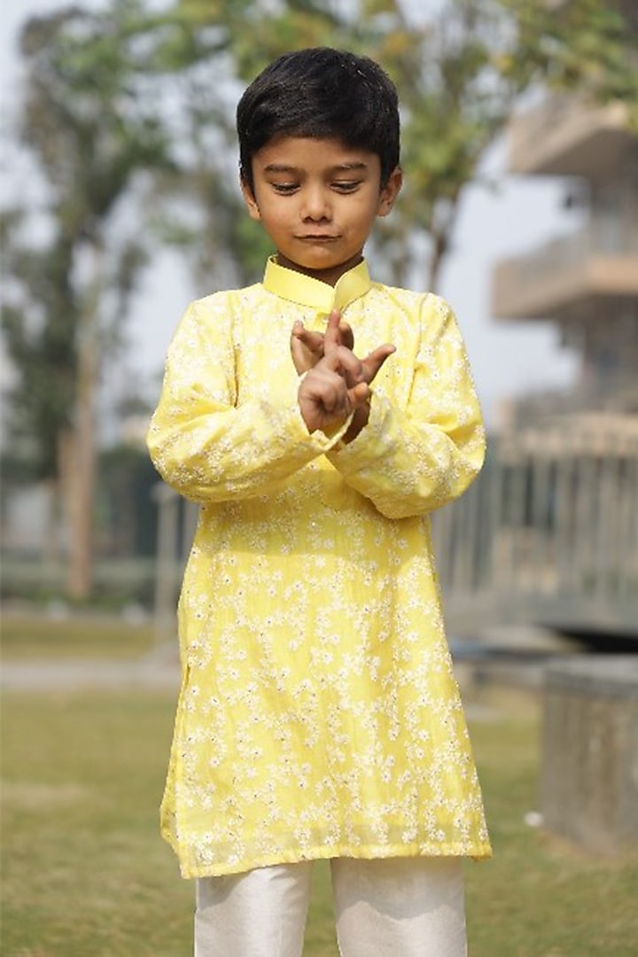 Yellow Pure Mul Chanderi Floral Jaal Embroidered Kurta Set For Boys by Taber Tikri at Pernia's Pop Up Shop