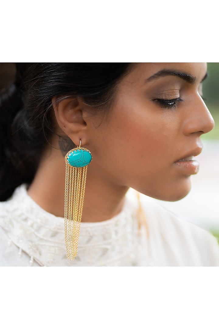 Gold Finish Turquoise Stone Dangler Earrings In Sterling Silver by Tanvi Garg at Pernia's Pop Up Shop