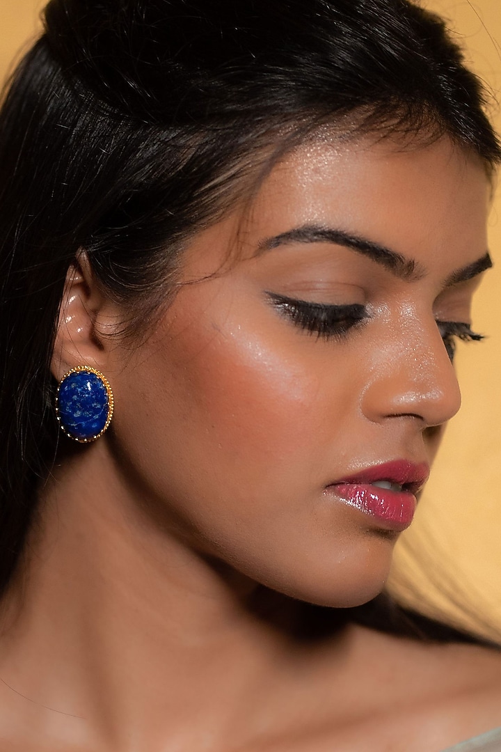 Gold Finish Lapis Lazuli Stud Earrings In Sterling Silver by Tanvi Garg at Pernia's Pop Up Shop
