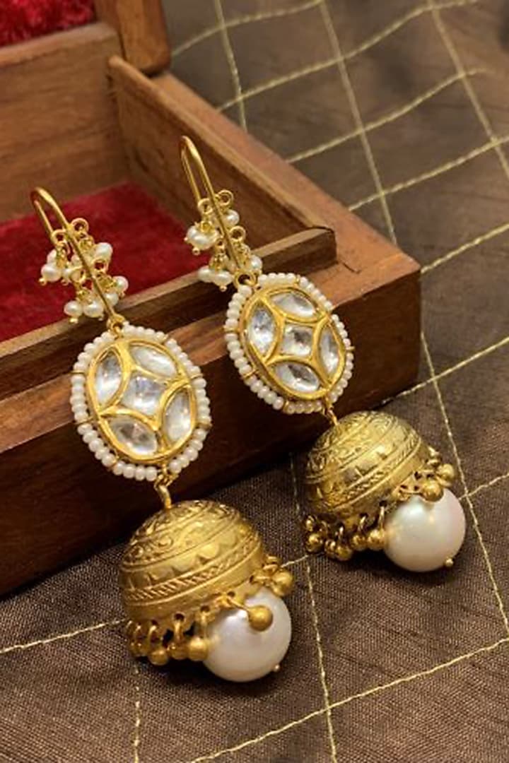 Gold Finish Kundan & Pearl Handcrafted Jhumka Earrings In Sterling Silver by Tanvi Garg