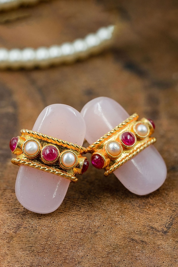 Gold Finish Rose Quartz Stud Earrings In Sterling Silver by Tanvi Garg at Pernia's Pop Up Shop