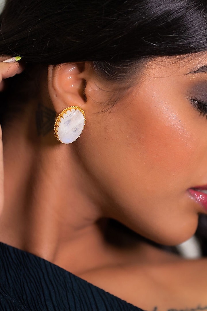 Gold Finish Moonstone Stud Earrings In Sterling Silver by Tanvi Garg