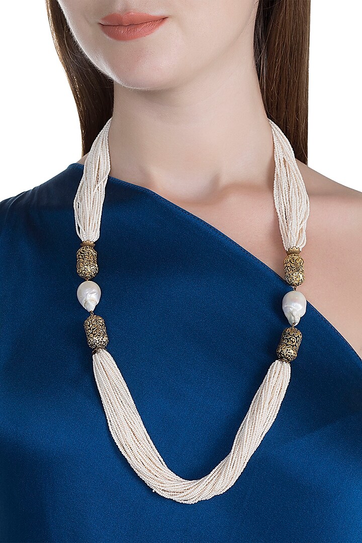 Gold Finish Pearls & Antique Beads String Necklace by Tanvi Garg