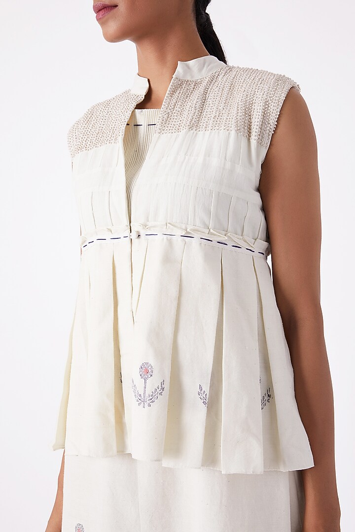 Off White Pleated Short Overlayer Top by Tahweave at Pernia's Pop Up Shop