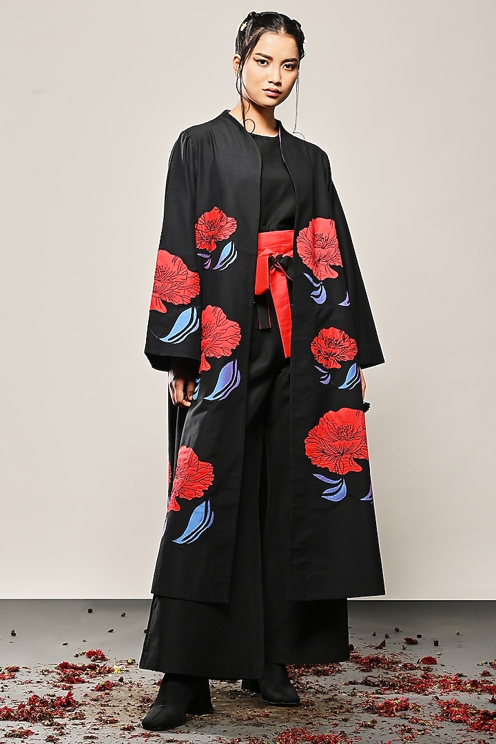 Black Cotton Silk Floral Applique Long Jacket by TAIKA by Poonam Bhagat