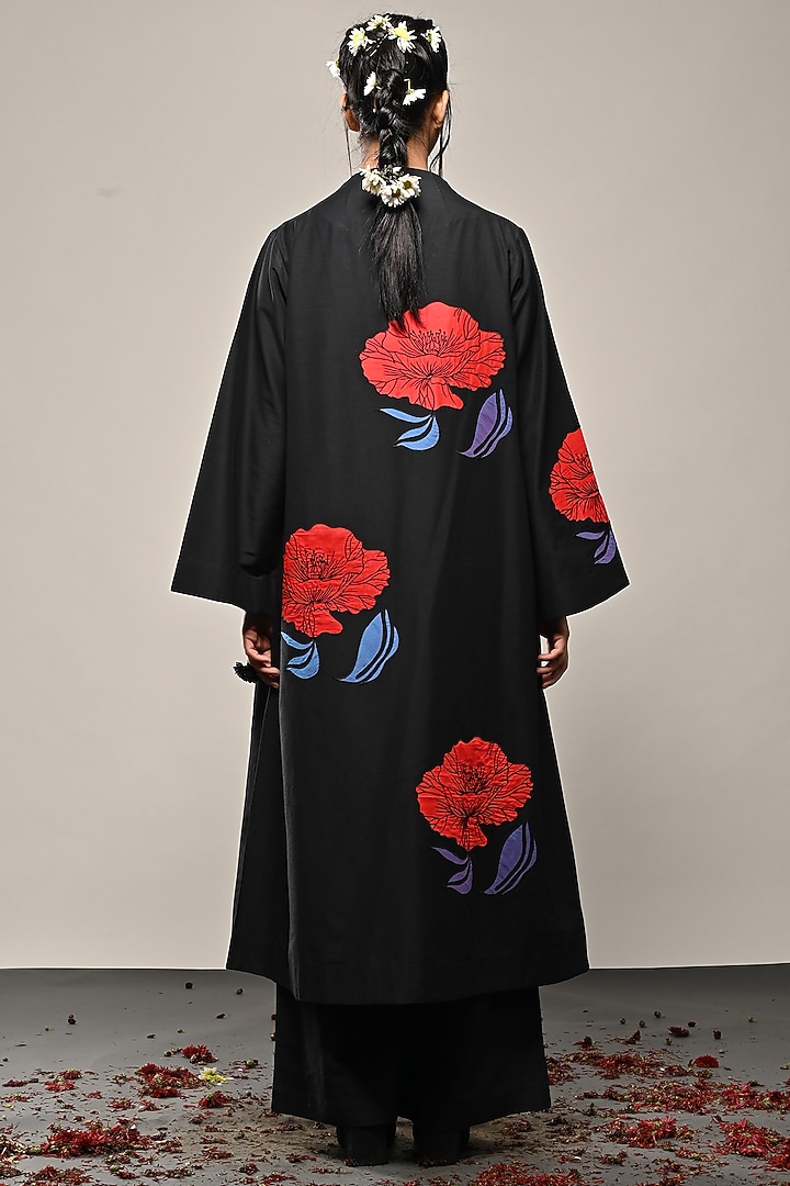 Black Cotton Silk Floral Applique Long Jacket by TAIKA by Poonam Bhagat at Pernia's Pop Up Shop