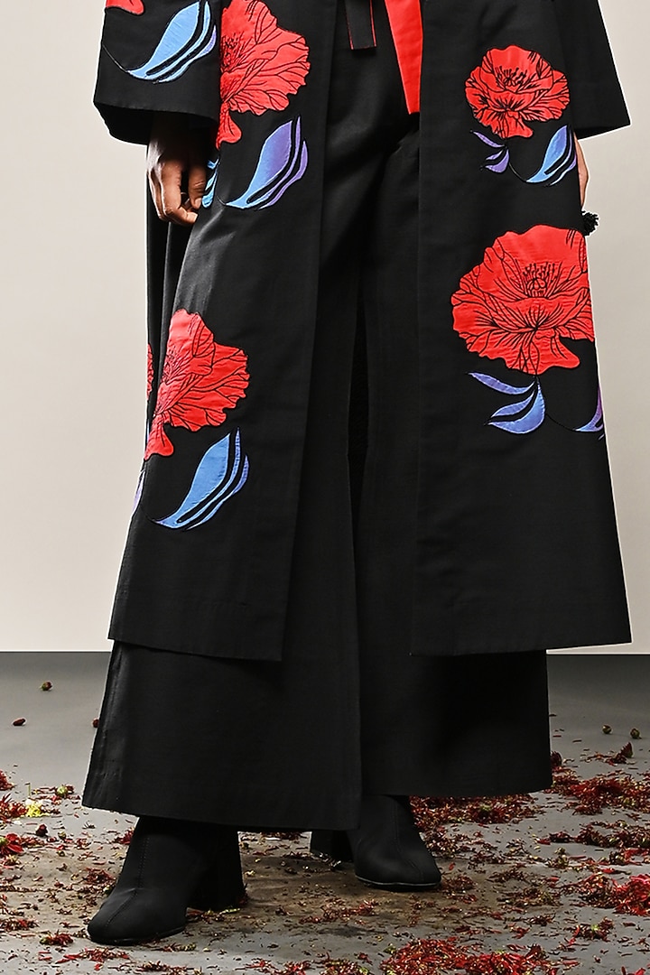 Black Cotton Silk Floral Applique Long Jacket by TAIKA by Poonam Bhagat at Pernia's Pop Up Shop