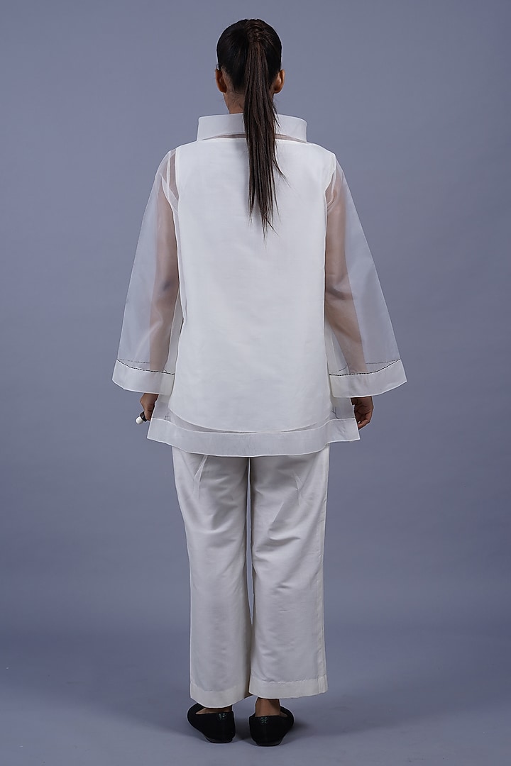 Egg White Organza Machine Embroidered Top by Taika By Poonam Bhagat at Pernia's Pop Up Shop